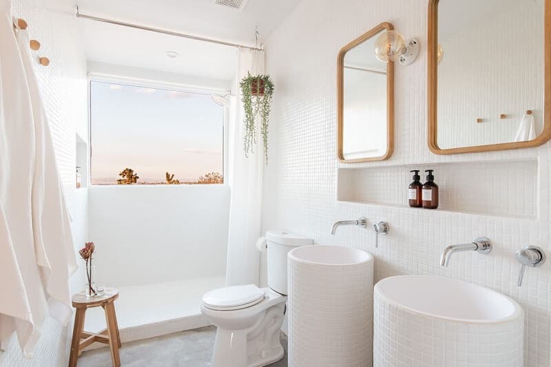 Compact bathroom with a shower, vanity and toilet