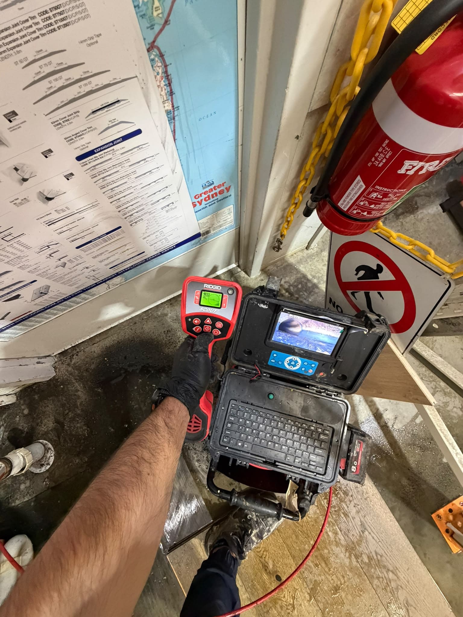 Drain camera monitor and handheld pipe locator