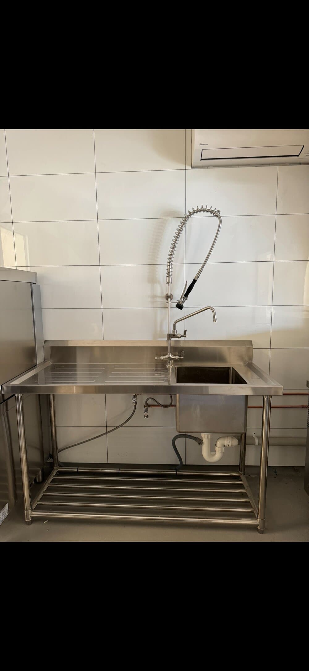 Commercial sink with pre-rinse spray