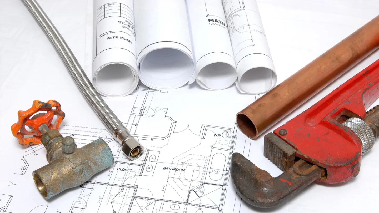 Plumber working on renovation plumbing in a Bonnyrigg Heights home